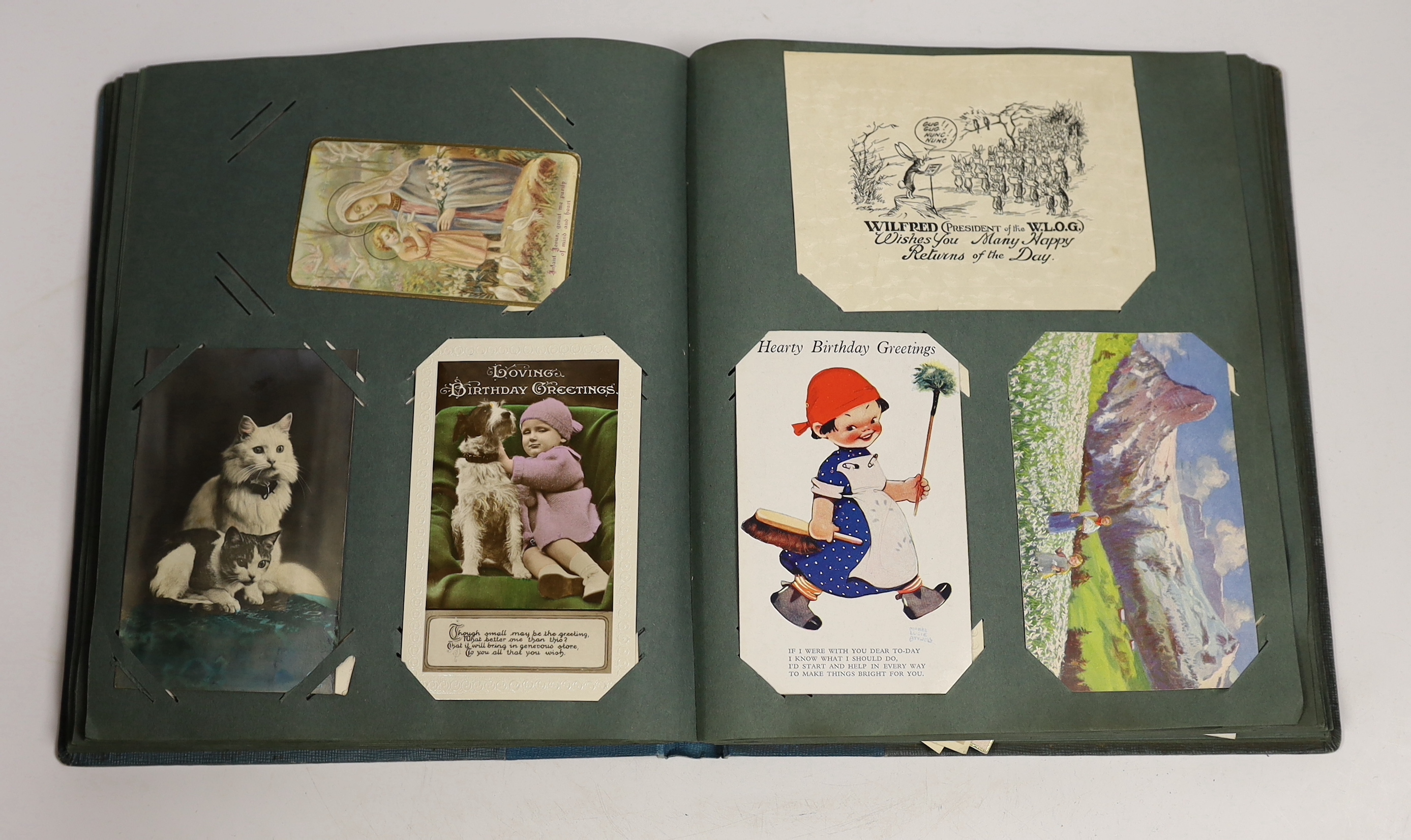 A postcard album containing Edwardian and later postcards relating to Bonzo, Attwell etc